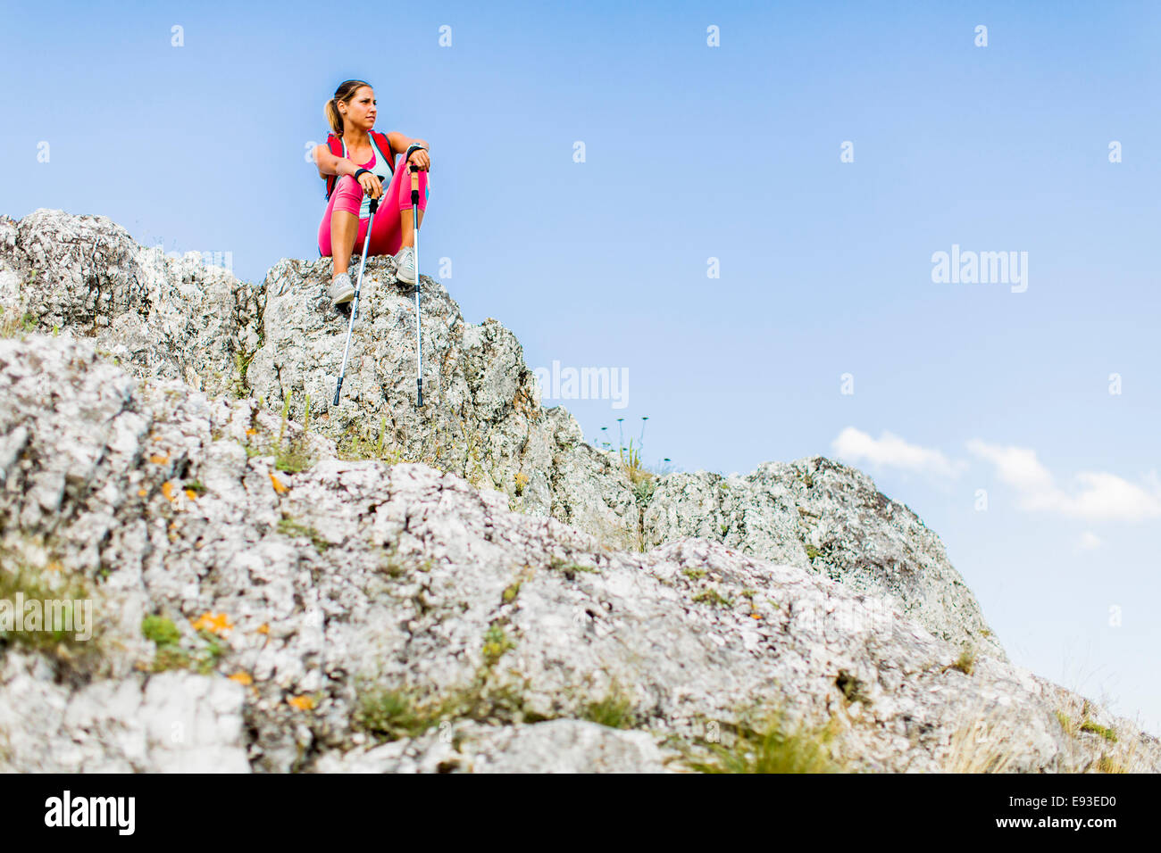 Young woman hiking on the mountain Stock Photo - Alamy