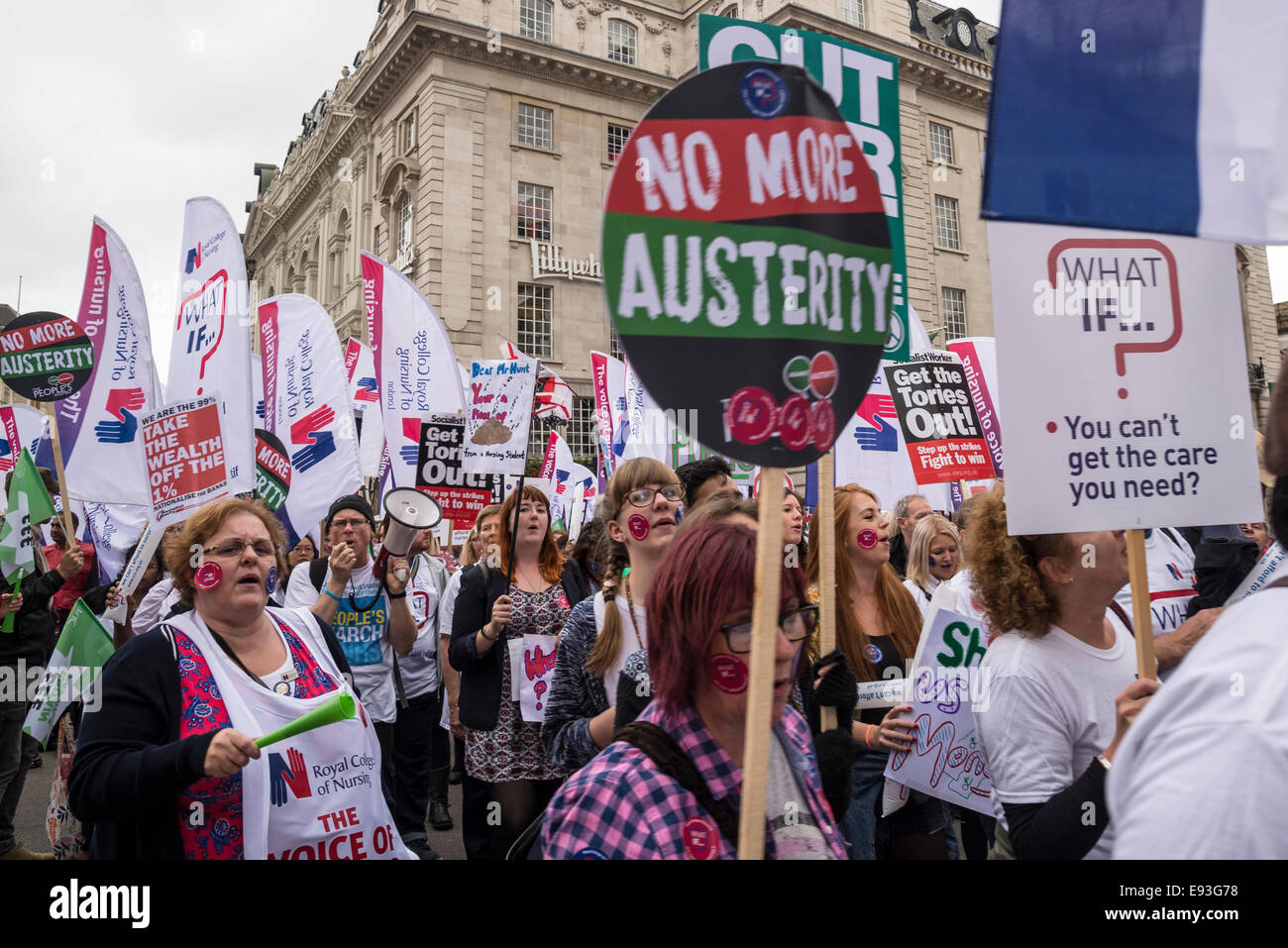 Demonstrators with Royal College of Nursing flags and No More Austerity placards. Britain Needs a Pay Rise march, London, 18 October 2014, UK Credit:  Bjanka Kadic/Alamy Live News Stock Photo