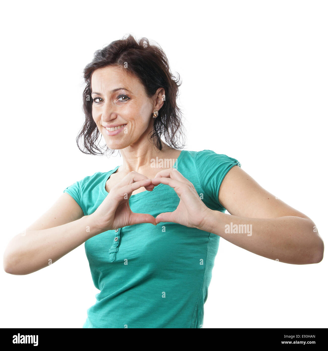 mid age woman forming heart shape Stock Photo