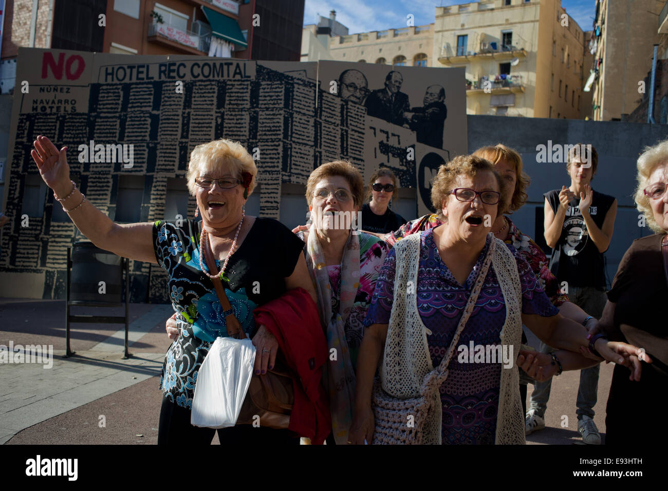 Oct. 18, 2014 - Barcelona, Catalonia, Spain. In Barcelona elderly women shout slogans against the construction of a new hotel. One hundred residents took to the streets in Barcelona to protest a new hotel project in the old part of the city. Barcelona is taking several neighborhood protests against the growing tourism massification. In this case the protest is against the hotel projected at Rec Comtal zone, according to neighborhood sources over ten new hotels are planned in the area. Stock Photo