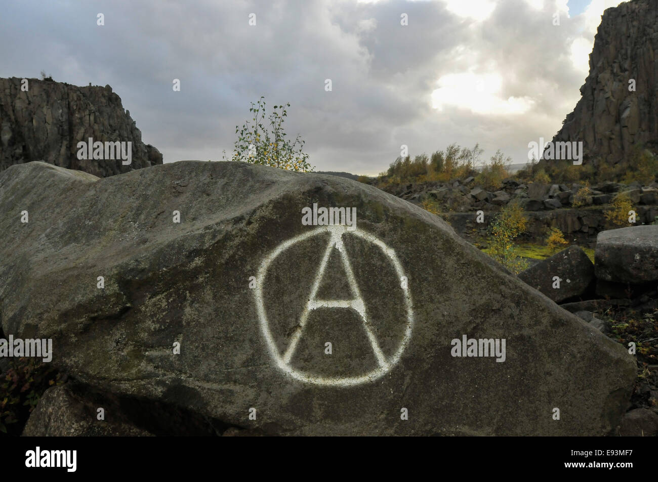 Anarchy symbol on a rock at Cambusbarron Quarry, Stirling, Scotland, UK