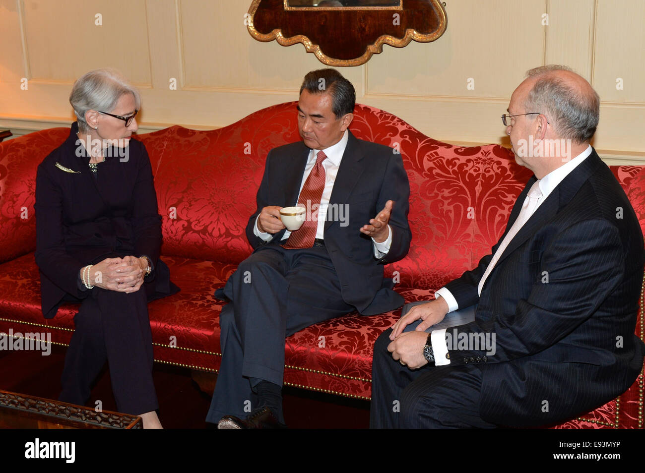 Under Secretary for Political Affairs Wendy Sherman and Assistant Secretary  of State for the Bureau of East Asian and Pacific Affairs Daniel Russel  chat with Chinese Foreign Minister Wang Yi chat before