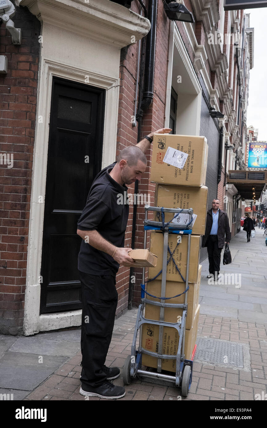 Delivery made using trolley in Soho, London Stock Photo Alamy