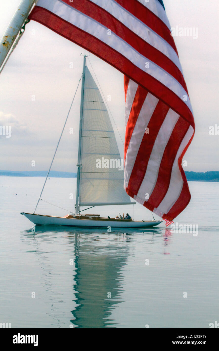 Sail Boat framed by American Flag Stock Photo Alamy