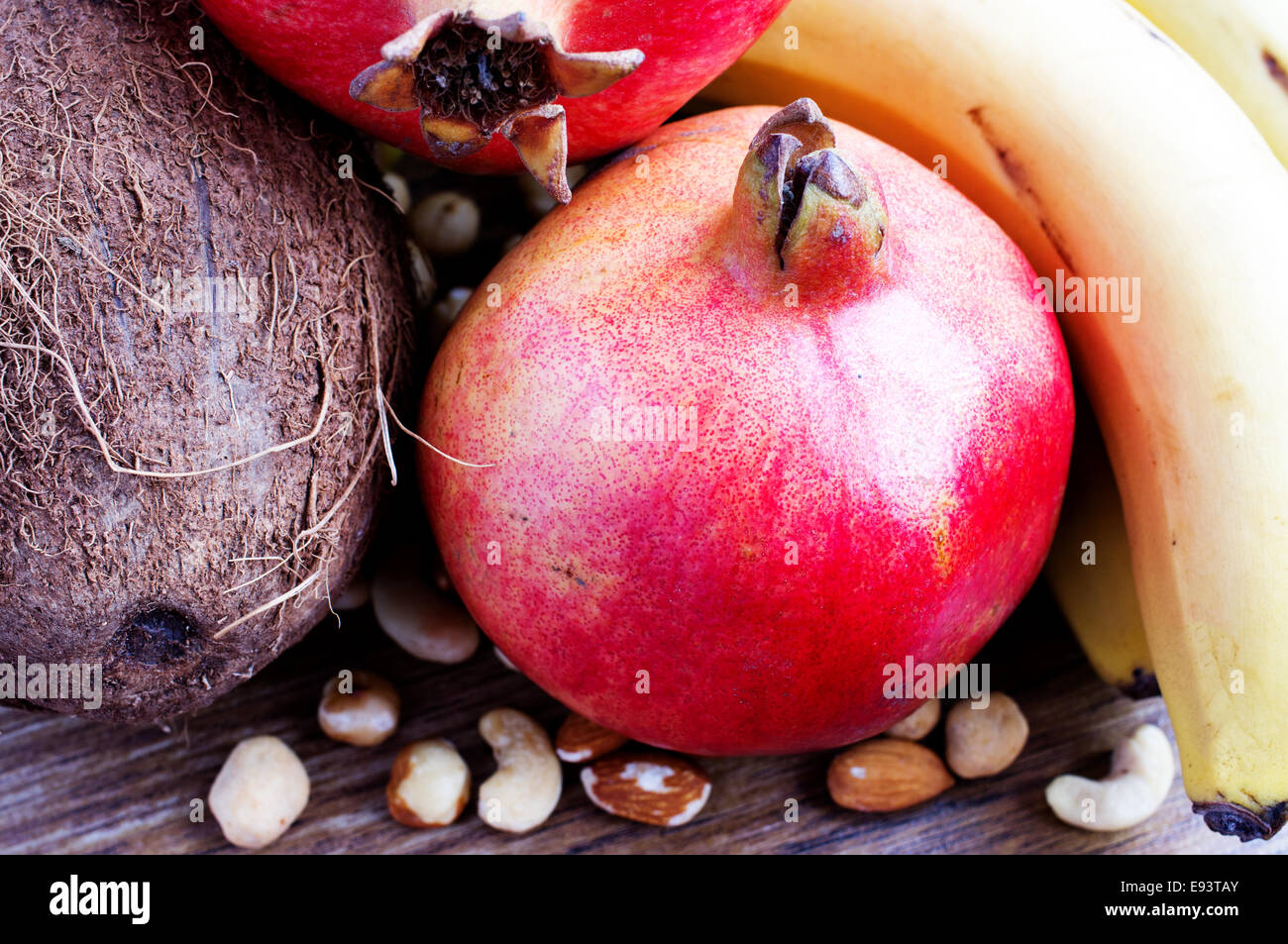 Fruits coconut, pomegranate, banana, nuts Stock Photo Alamy