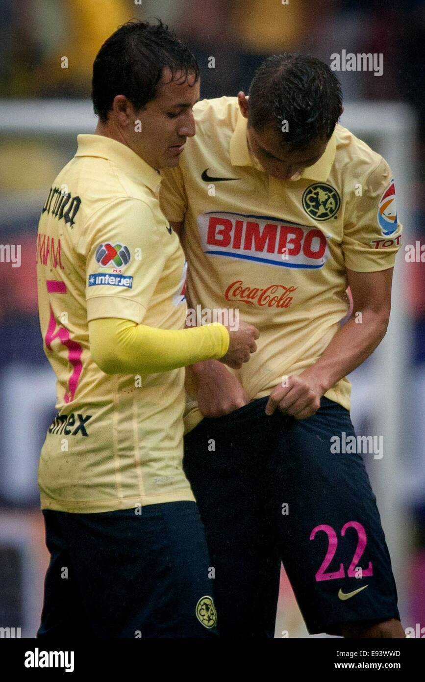 Mexico City, Mexico. 18th Oct, 2014. America's Paul Aguilar (R) reacts during the match of the MX League Opening Tournament 2014 against Monterrey at Azteca Stadium, in Mexico City, capital of Mexico, on Oct. 18, 2014. Credit:  Pedro Mera/Xinhua/Alamy Live News Stock Photo