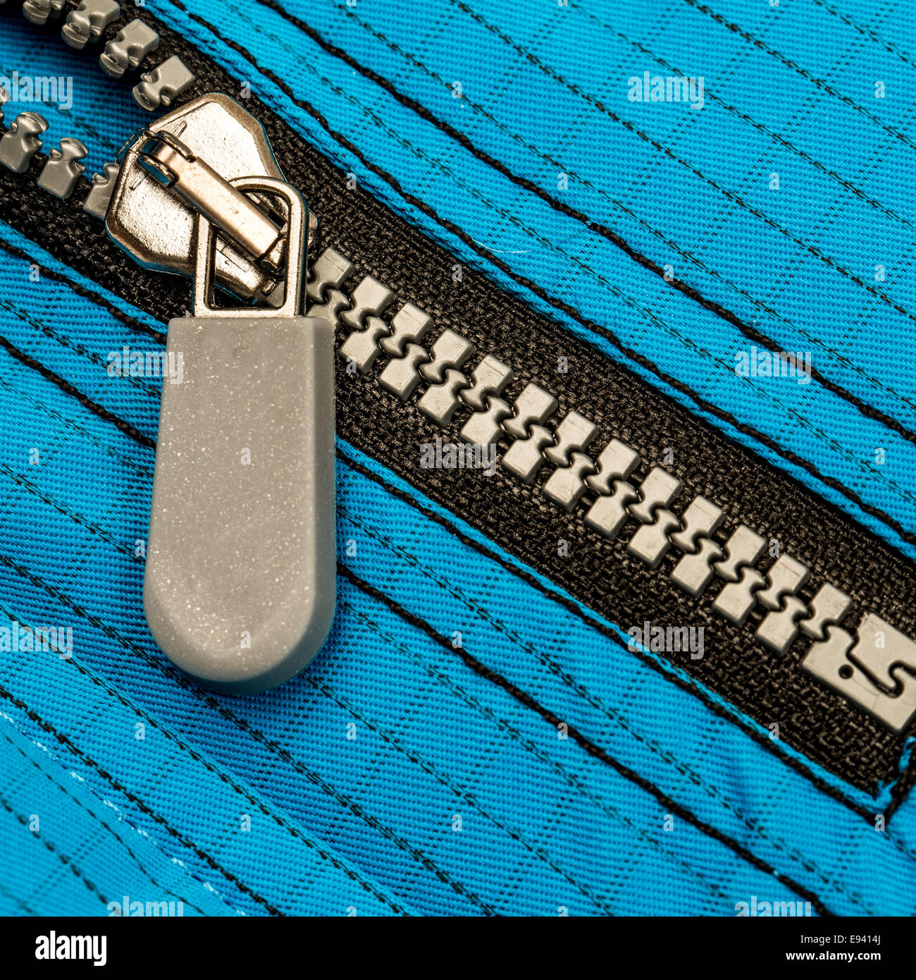 Close up zipper on a black background Stock Photo - Alamy