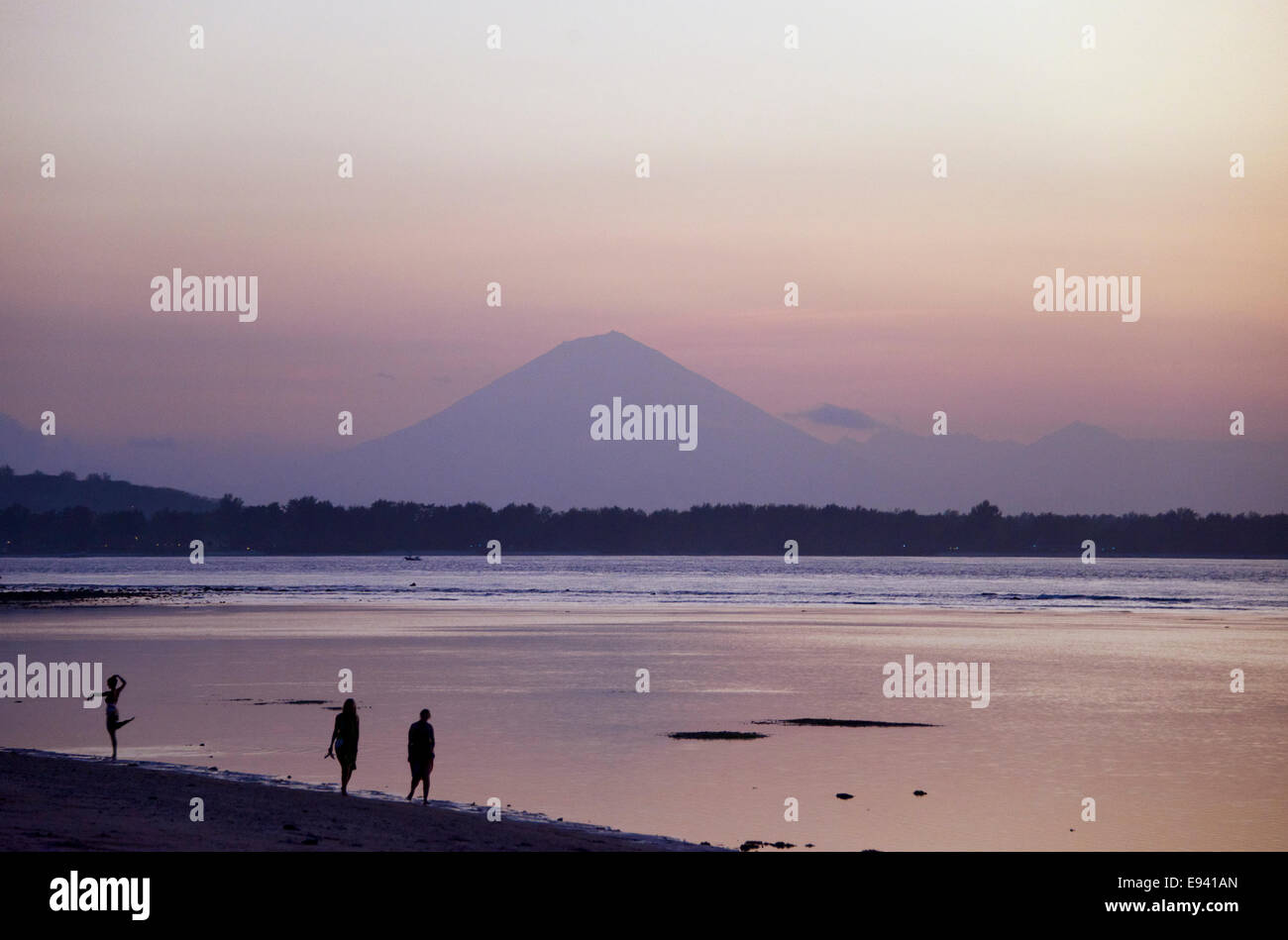 Twilight Gili Air with Mount Agung Bali in distance Indonesia Stock Photo
