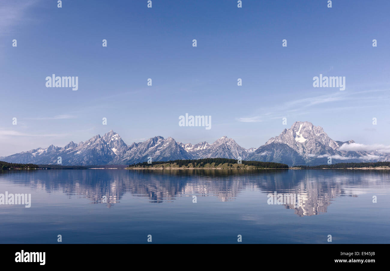 Jenny Lake with the Grand Tetons in the background on a fine morning in summer near Jackson, Wyoming, USA. Stock Photo