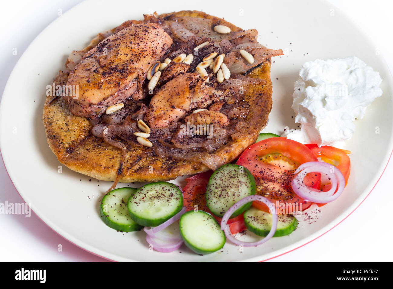 Musakhan, traditional Palestinian sumac chicken, on a plate with a