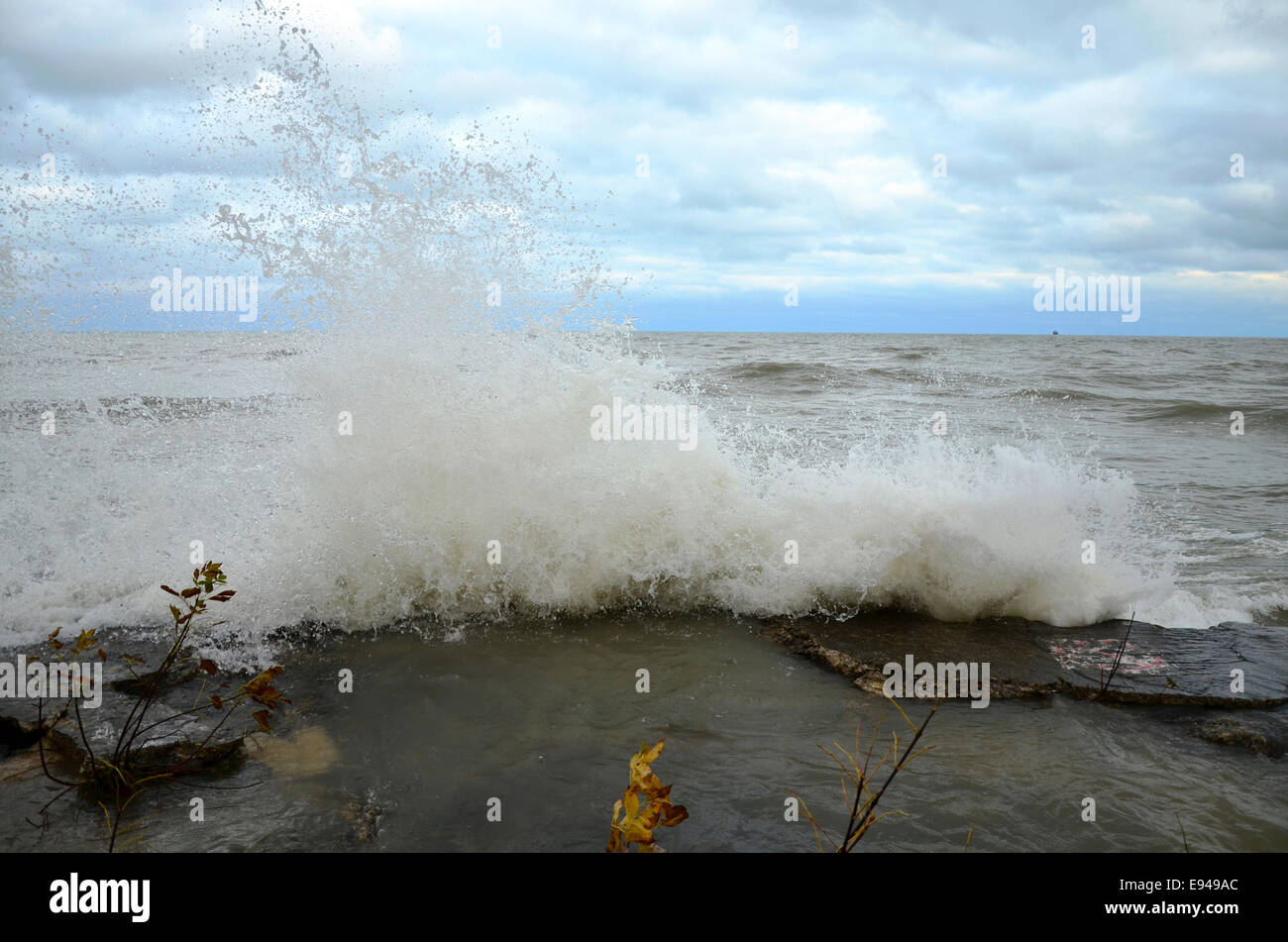 Waves hitting the Chicago shore Stock Photo
