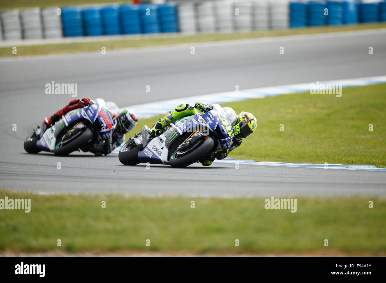 Phillip Island, Australia. 19th Oct, 2014. Valentino Rossi on bike number 46 on his way to vicory in the motoGP class after passing Jorge Lorenzo on bike 99 at 2014 Tissot Australian Motorcycle Grand Prix Credit:  Jandrie Lombard/Alamy Live News Stock Photo