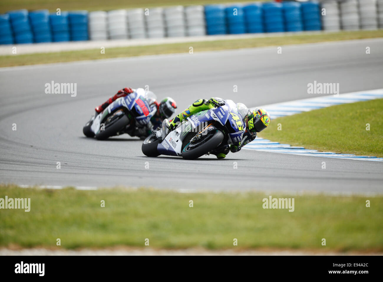 Phillip Island, Australia. 19th Oct, 2014. Valentino Rossi on bike number 46 on his way to vicory in the motoGP class after passing Jorge Lorenzo on bike 99 at 2014 Tissot Australian Motorcycle Grand Prix Credit:  Jandrie Lombard/Alamy Live News Stock Photo