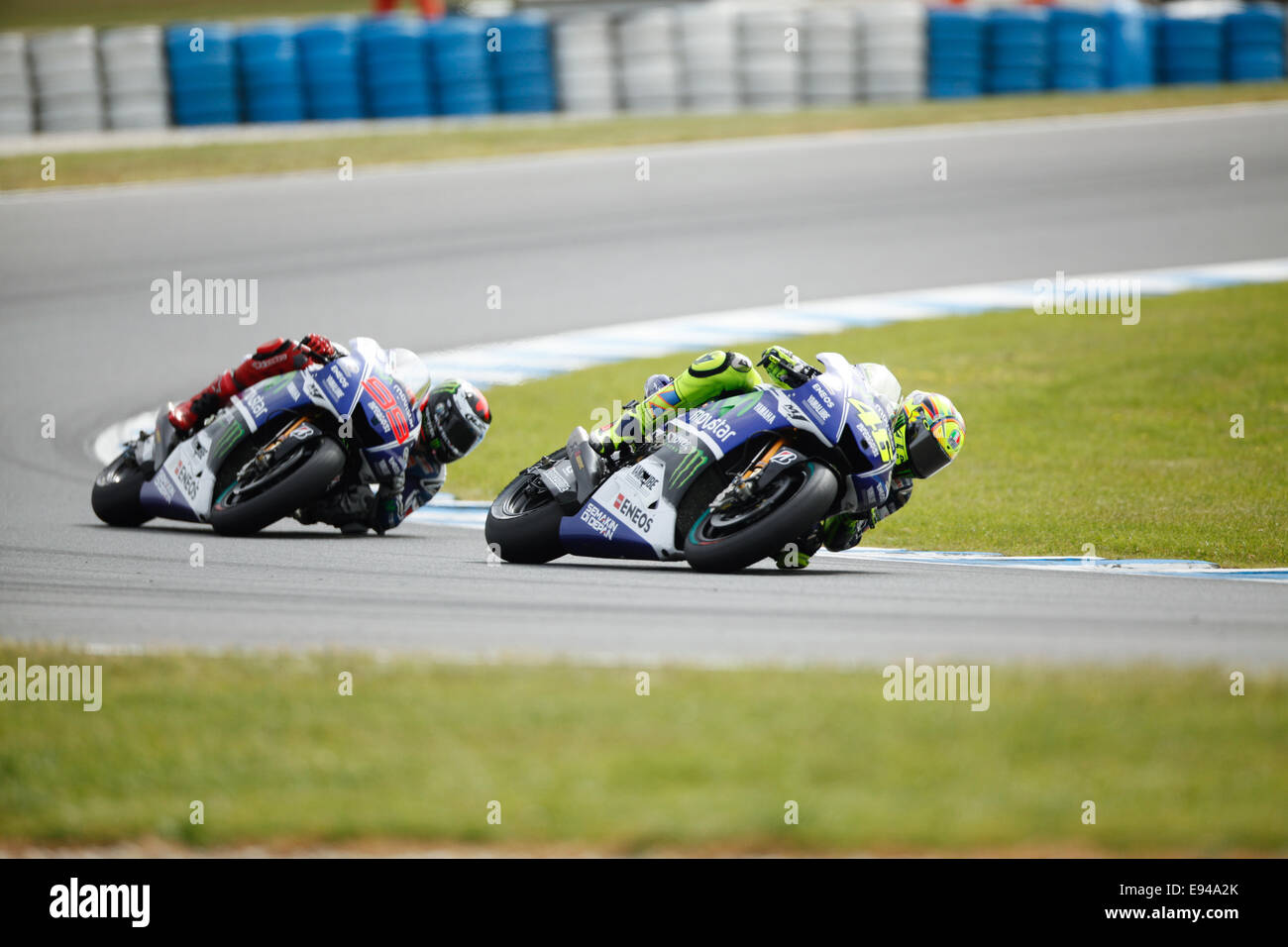Phillip Island, Australia. 19th Oct, 2014. Valentino Rossi on bike number 46 on his way to vicory in the motoGP class after passing Jorge Lorenzo on bike 99 at 2014 Tissot Australian Motorcycle Grand Prix Credit:  Jandrie Lombard/Alamy Live News Stock Photo