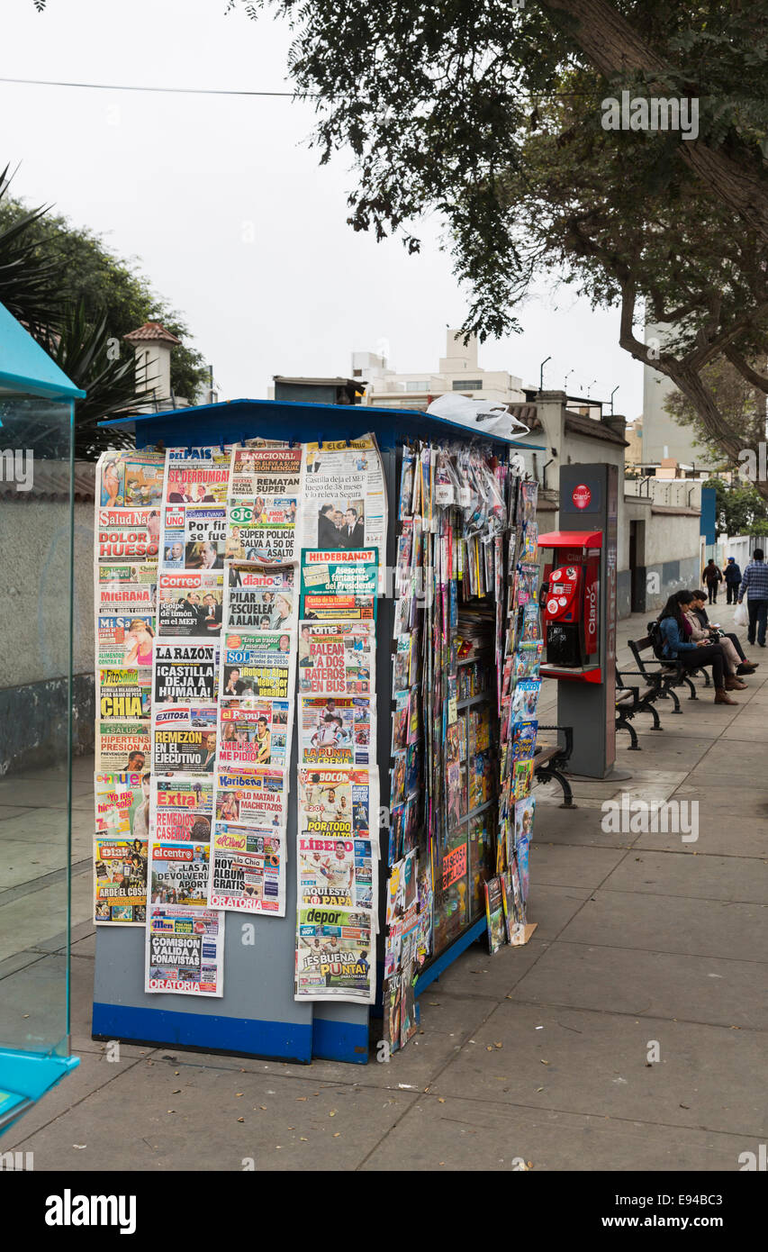 Local lifestyle: roadside newspaper stand in Miraflores, a suburb of Lima, capital city of Peru - typical regional suburban street scene Stock Photo