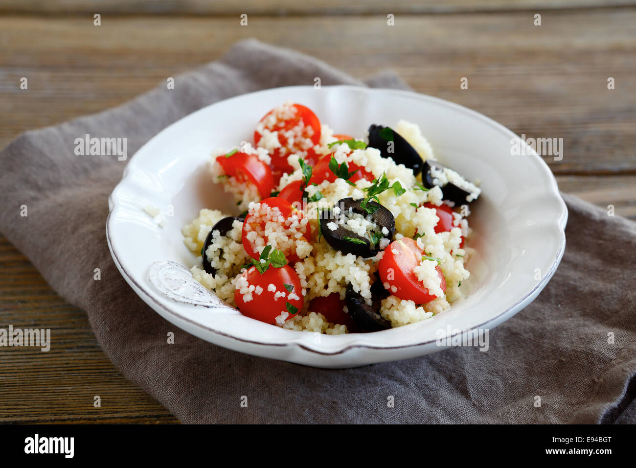 Light salad with couscous and vegetables, food Stock Photo Alamy