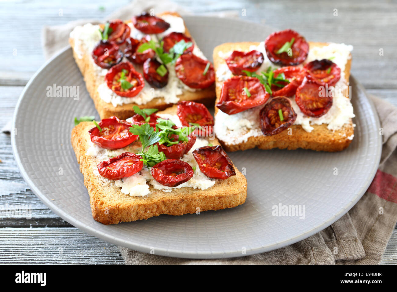 Bruschetta with sundried tomatoes and cheese, delicious food Stock