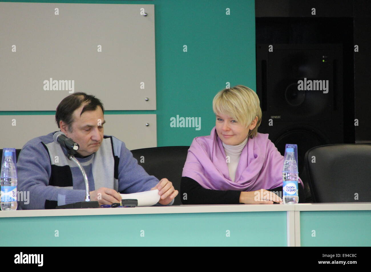 Moscow, Russia - February 11, 2012. Expert Andrei Buzin and policies Evgeniya Chirikova. Conference on the set of observers Stock Photo