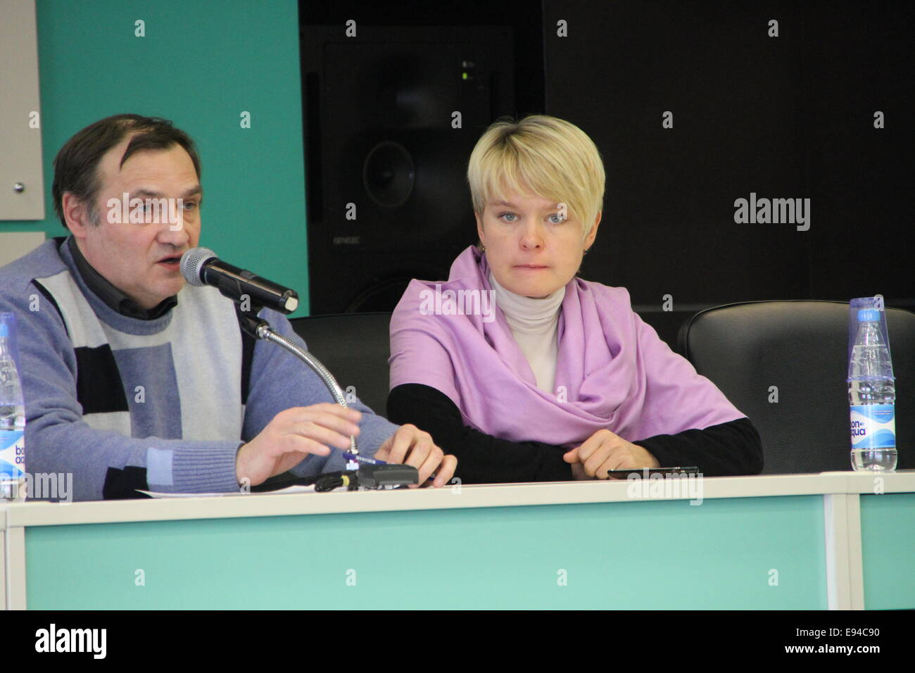 Moscow, Russia - February 11, 2012. Expert Andrei Buzin and policies Evgeniya Chirikova. Conference on the set of observers to t Stock Photo