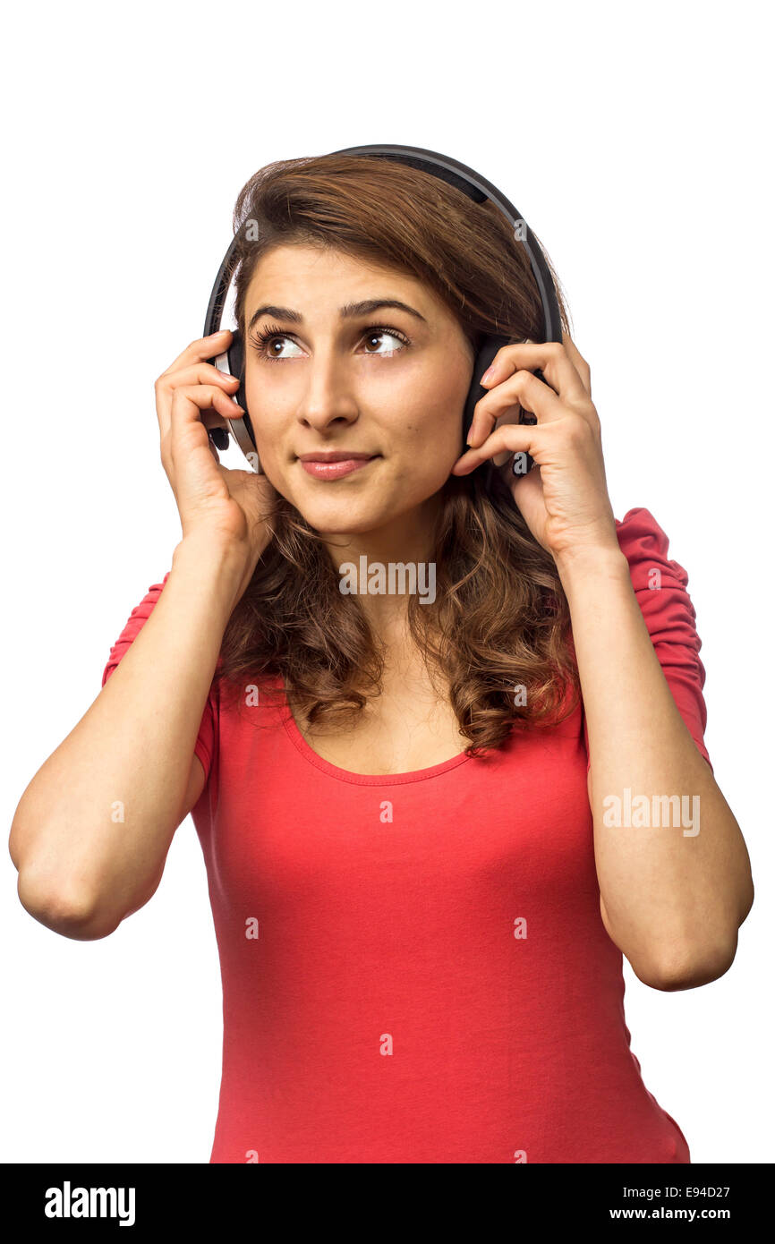Young woman with headphones daydreaming - isolated over white background Stock Photo