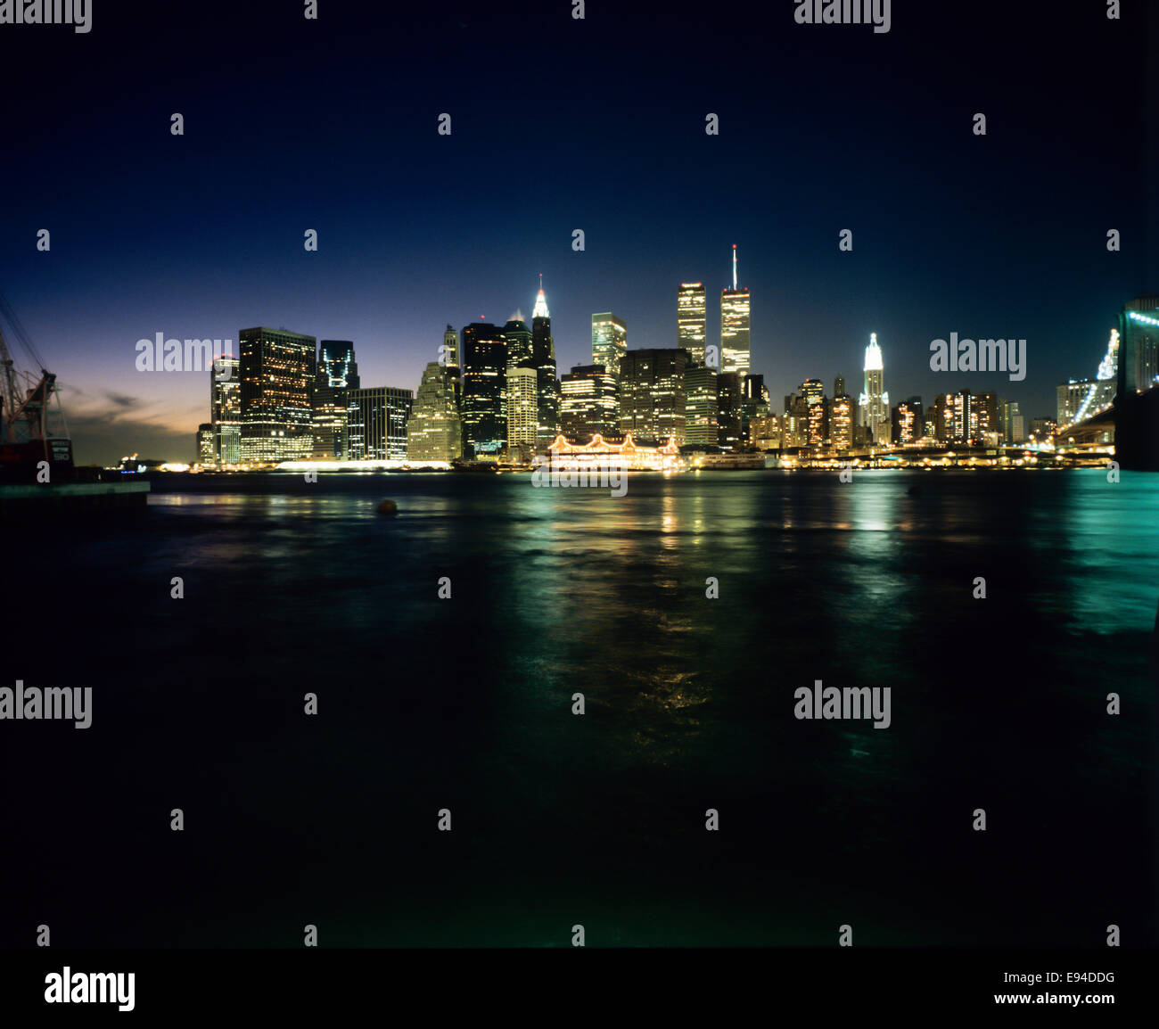 Lower Manhattan skyline and East river from Brooklyn at night prior to September 11 2001 New York City NY USA Stock Photo