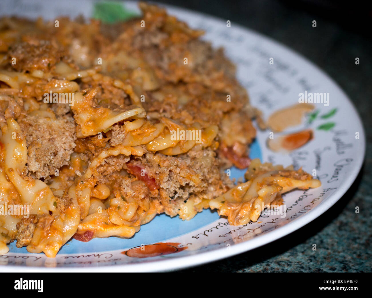 Tuna pasta bake with breadcrumbs and cheese prepared on a plate in the kitchen Stock Photo Alamy