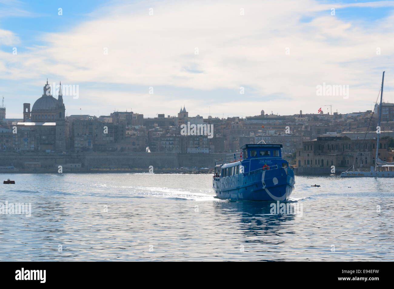 The Valletta to Sliema ferry with Valletta, the capital of Malta and the European Capital of Culture for 2018 in the background Stock Photo