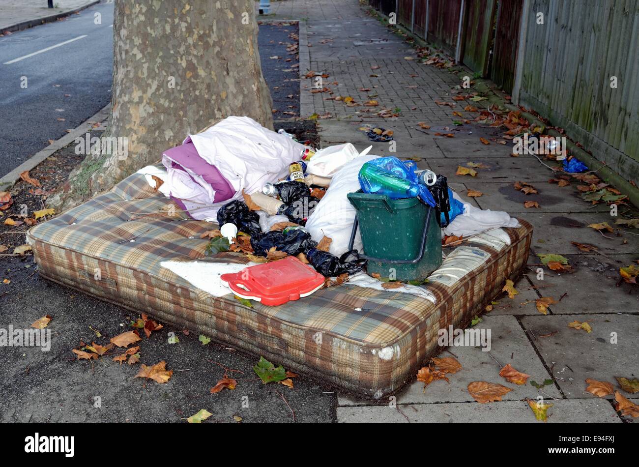 Dumped rubbish on a London suburban street Stock Photo