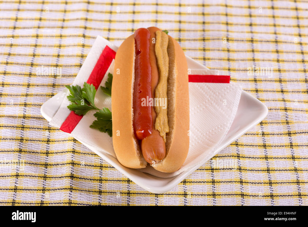 ordinary hot dog - bun with sausage and ketchup Stock Photo