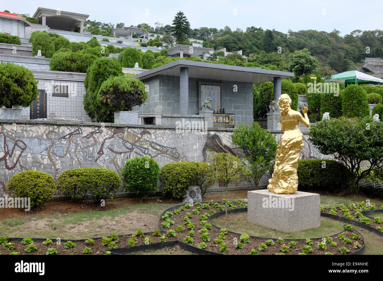 Rear view of golden Teresa Teng statue which is at her grave at Chin Pao Shan, Jinshan, New Taipei City, Taiwan Stock Photo