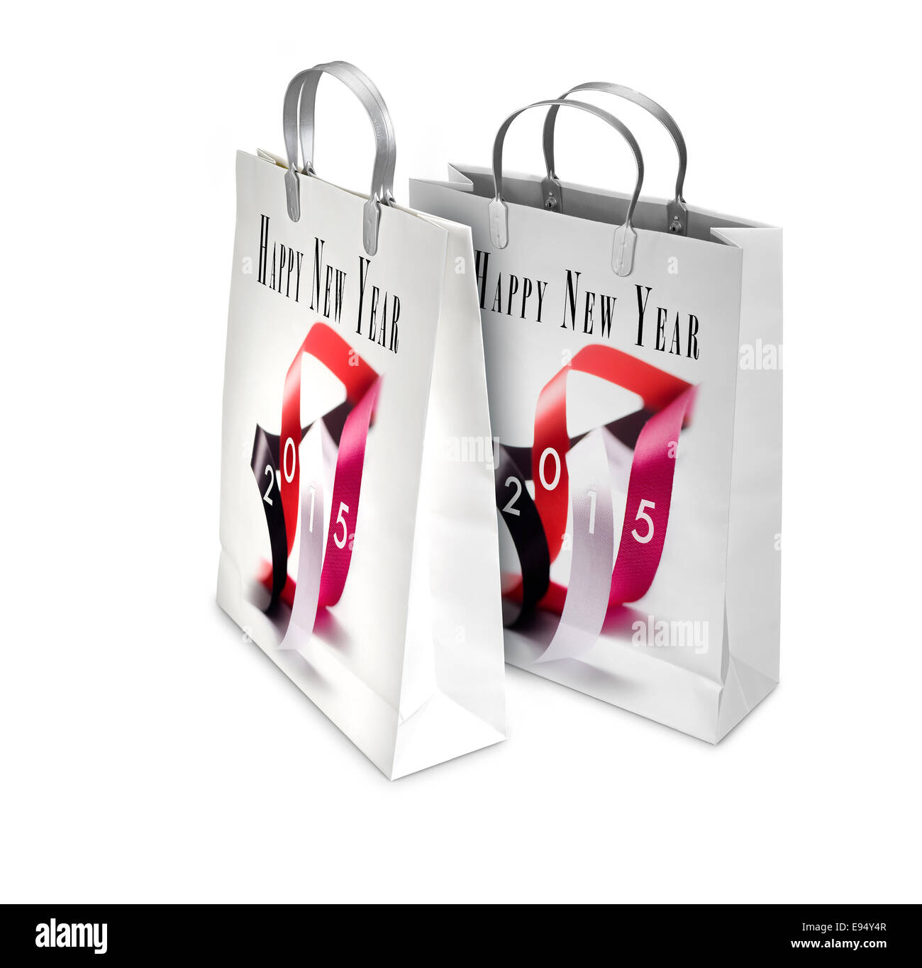 Two Shopping Bags opened and closed with New years greetings isolated on white. There is a different path for each bag Stock Photo