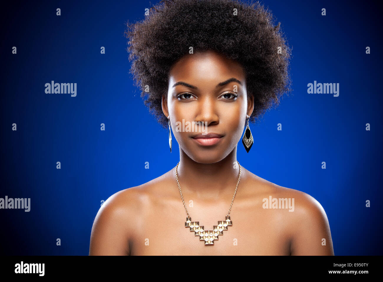 Beautiful young black woman with afro hairstyle Stock Photo - Alamy