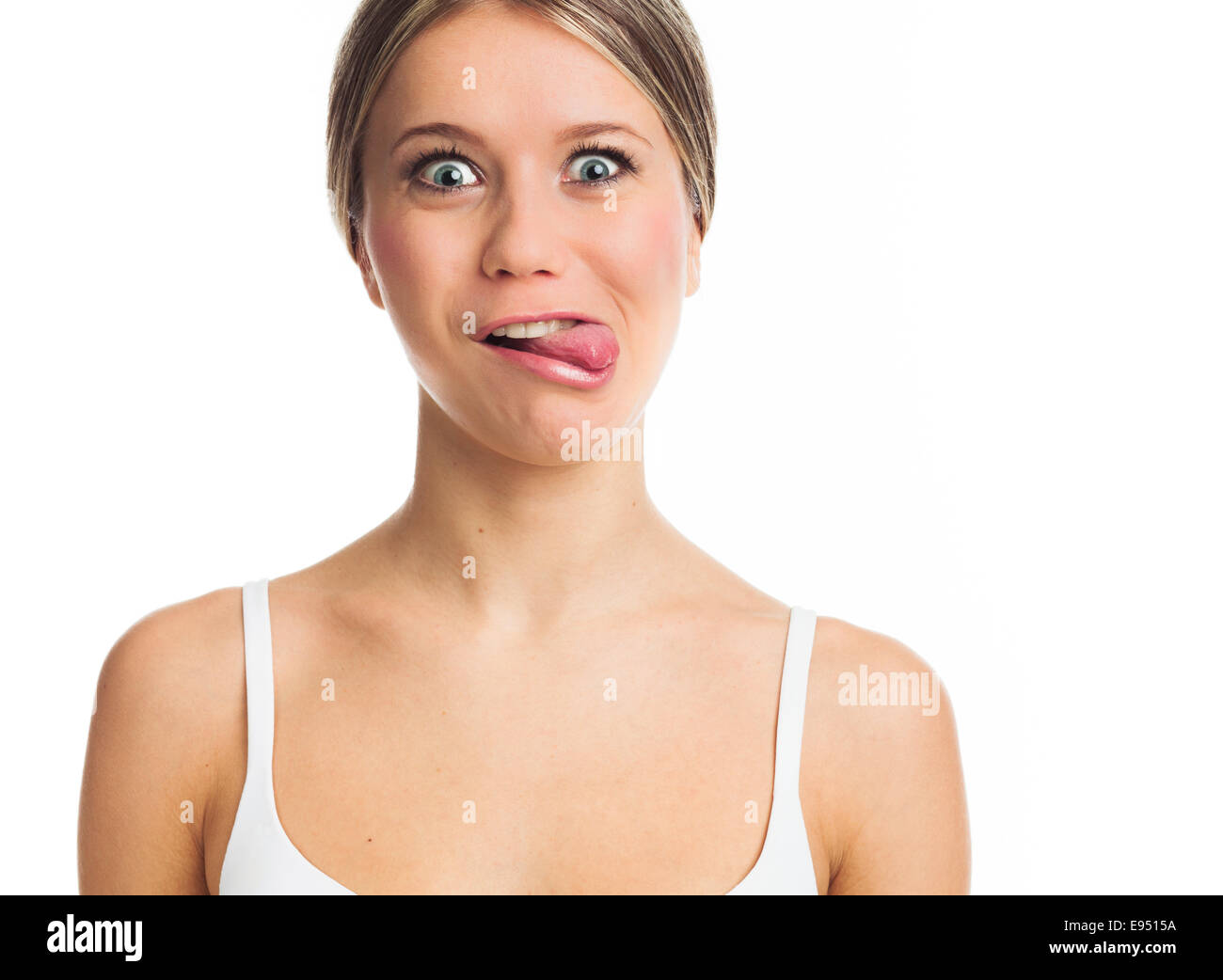 Young woman sticking tongue out hires stock photography and images Alamy