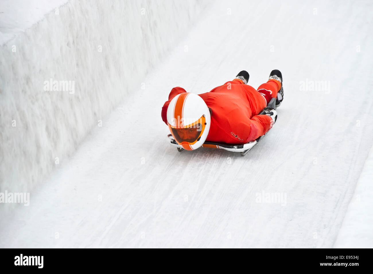 Skeleton rider on the ice track, St Moritz, Engadin, Grisons, Switzerland Stock Photo