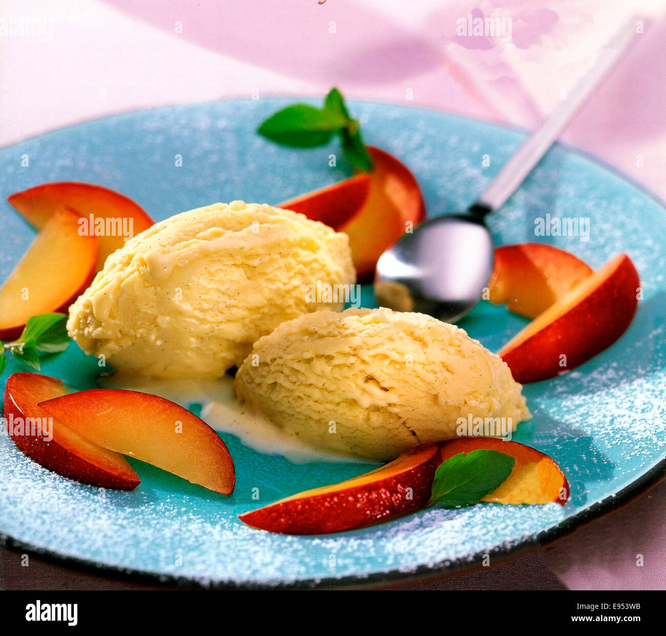 Dessert, cinnamon ice cream with plums Stock Photo