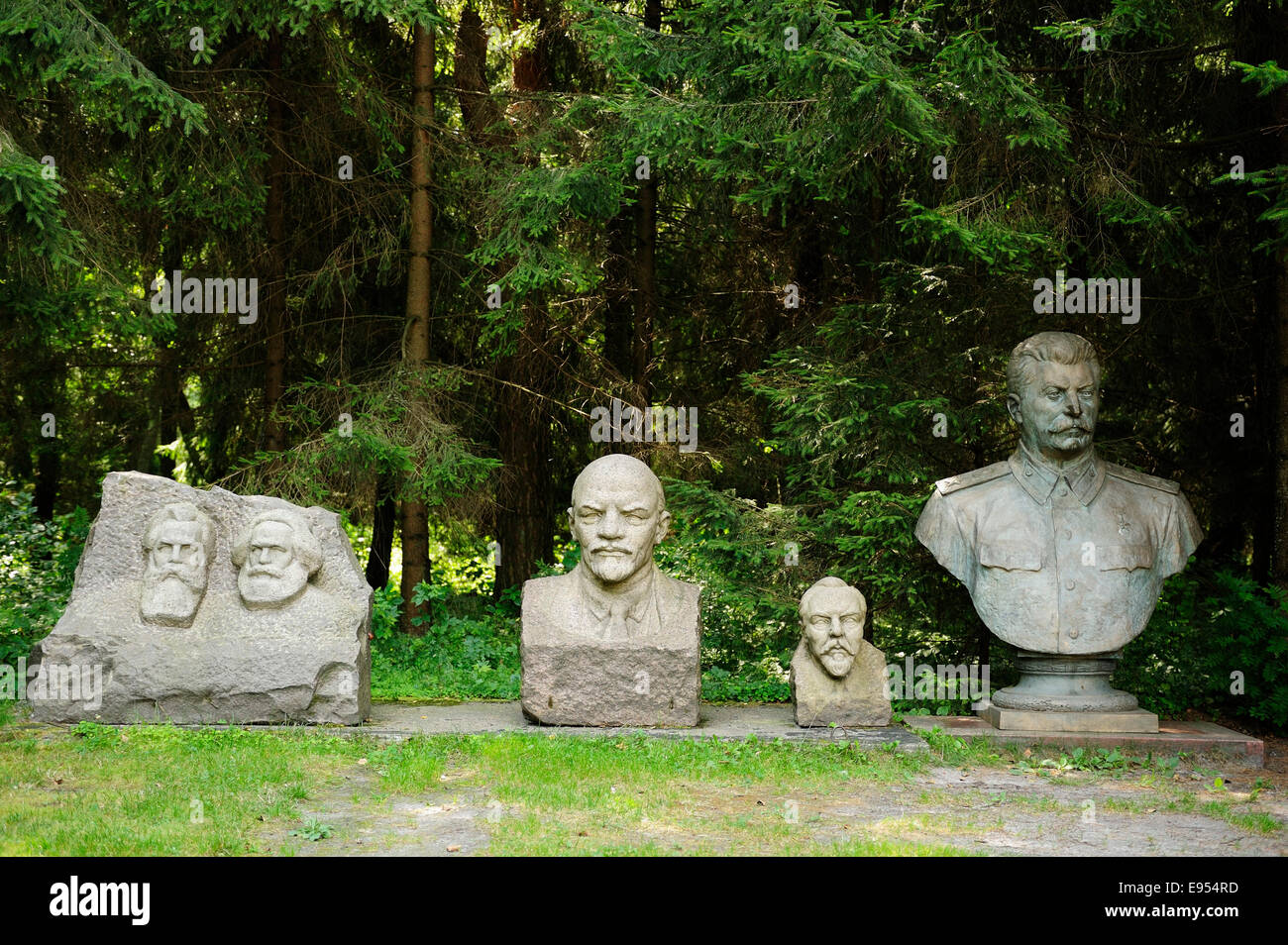 The busts of Engels, Marx, Lenin, and Stalin Kapsukas in the Sculpture Collection Grutas Park, Druskininkai, Lithuania Stock Photo