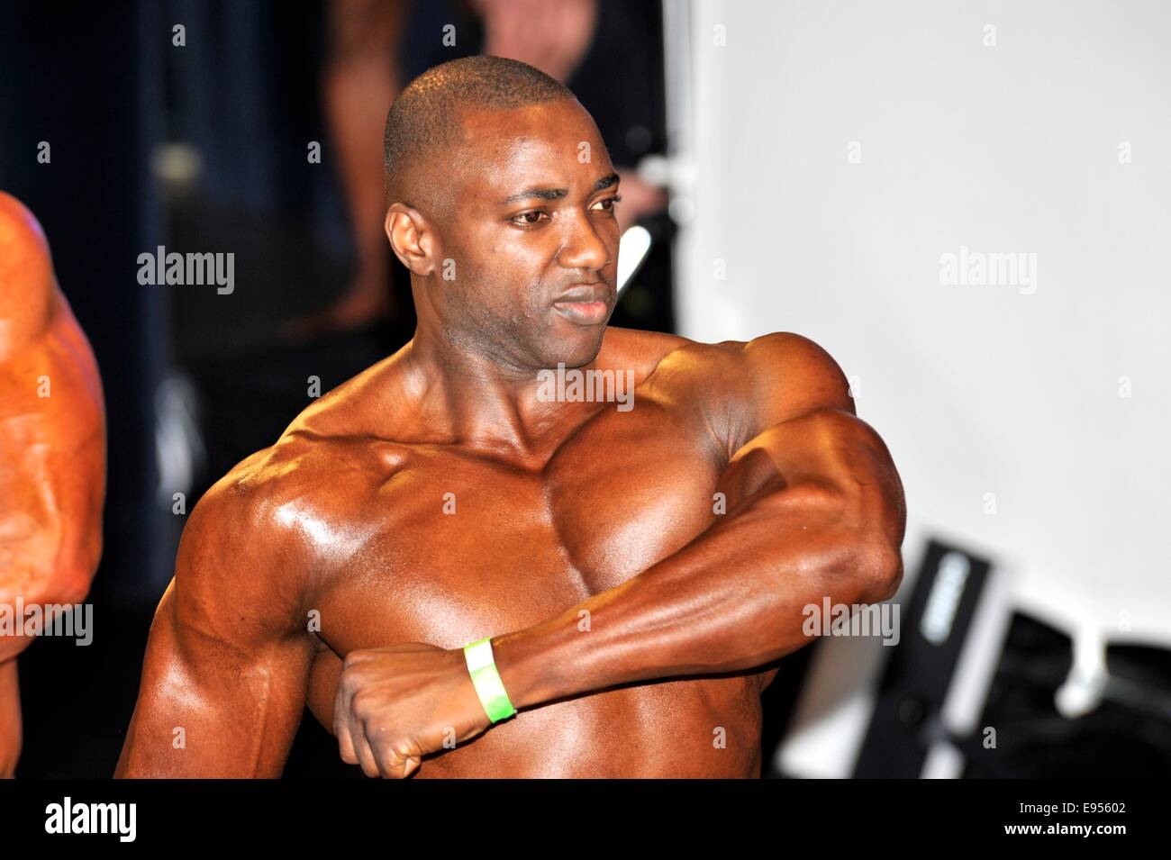 Roosendahl, The Netherlands. 19th Oct, 2014. Male bodybuilders showing  their best at the bodybuilding and fitness contest at the Walter's Open  Dutch Championship Bodybuilding and Fitness on oktober 19, 2014 in Theatre "