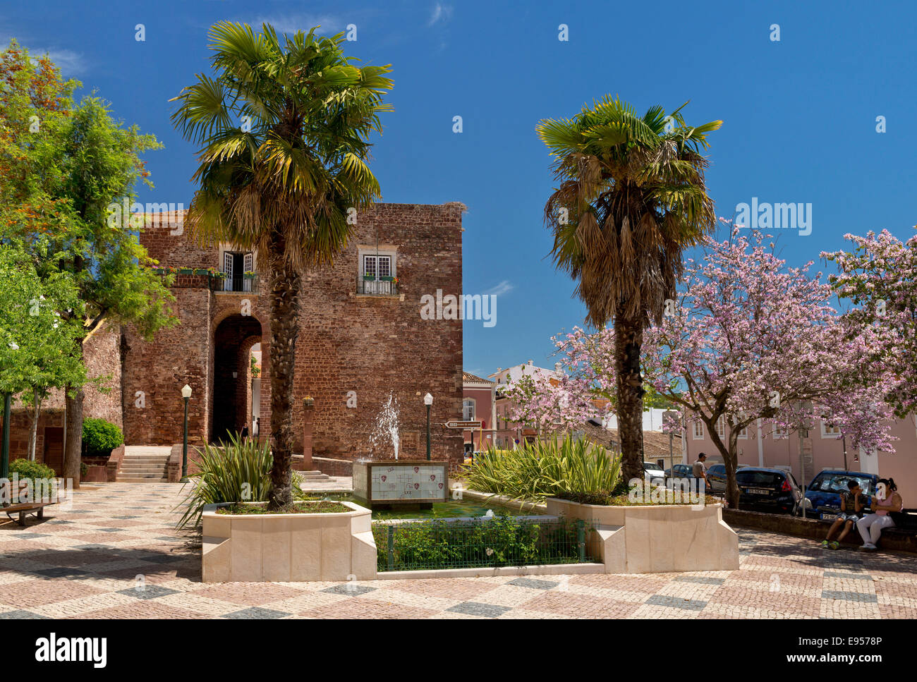 Portugal, the Algarve, Silves, the central square and entrance arch to the old town Stock Photo