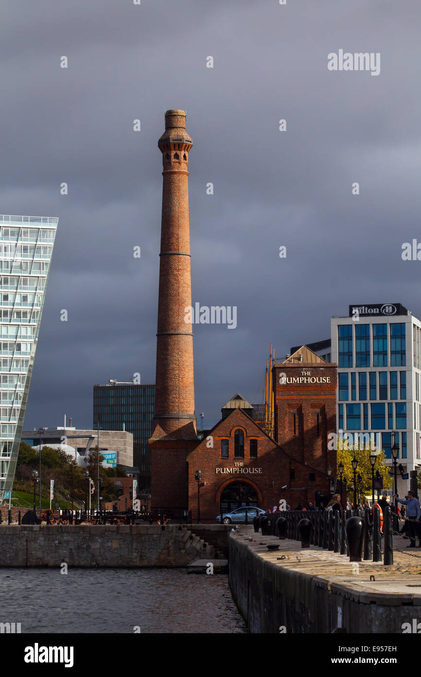 Tall red brick chimney on Liverpool Waterfront  The 1878 Pump House, Albert Dock, Liverpool, Merseyside, UK Stock Photo