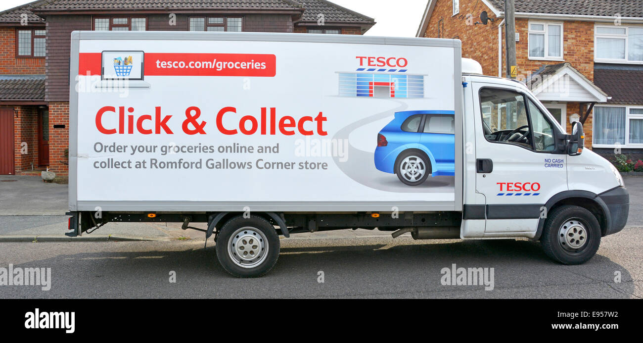 Tesco home delivery van dropping off groceries in a residential street with advert for Click & Collect service from local store Stock Photo