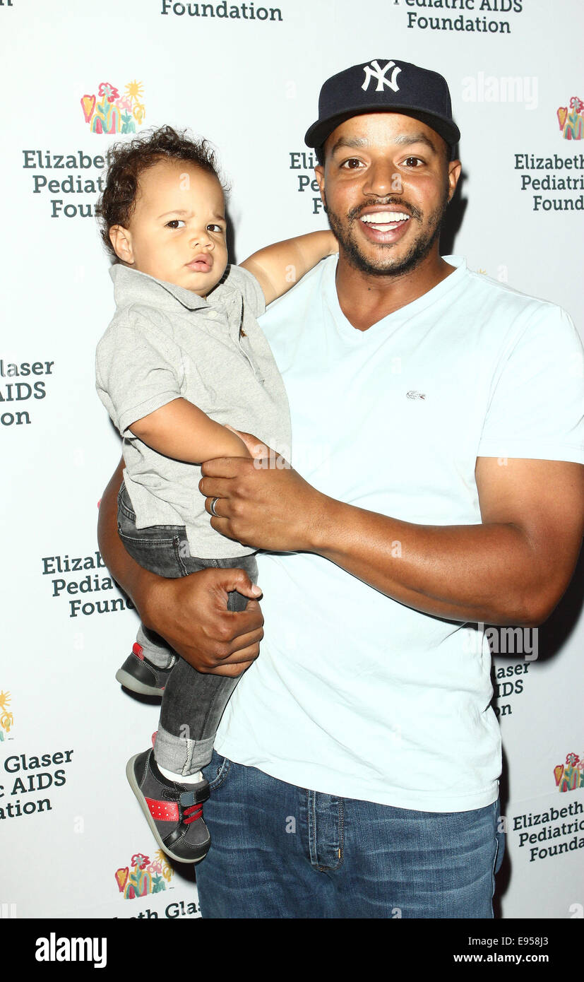 Los Angeles, California, USA. 19th Oct, 2014. Donald Faison, Rocco Faison attend Elizabeth Glaser Pediatric AIDS Foundation's 25th Annual ''A Time For Heroes'' Celebration on October 19th 2014 at The BookBindery, Culver City.California.USA. Credit:  TLeopold/Globe Photos/ZUMA Wire/Alamy Live News Stock Photo