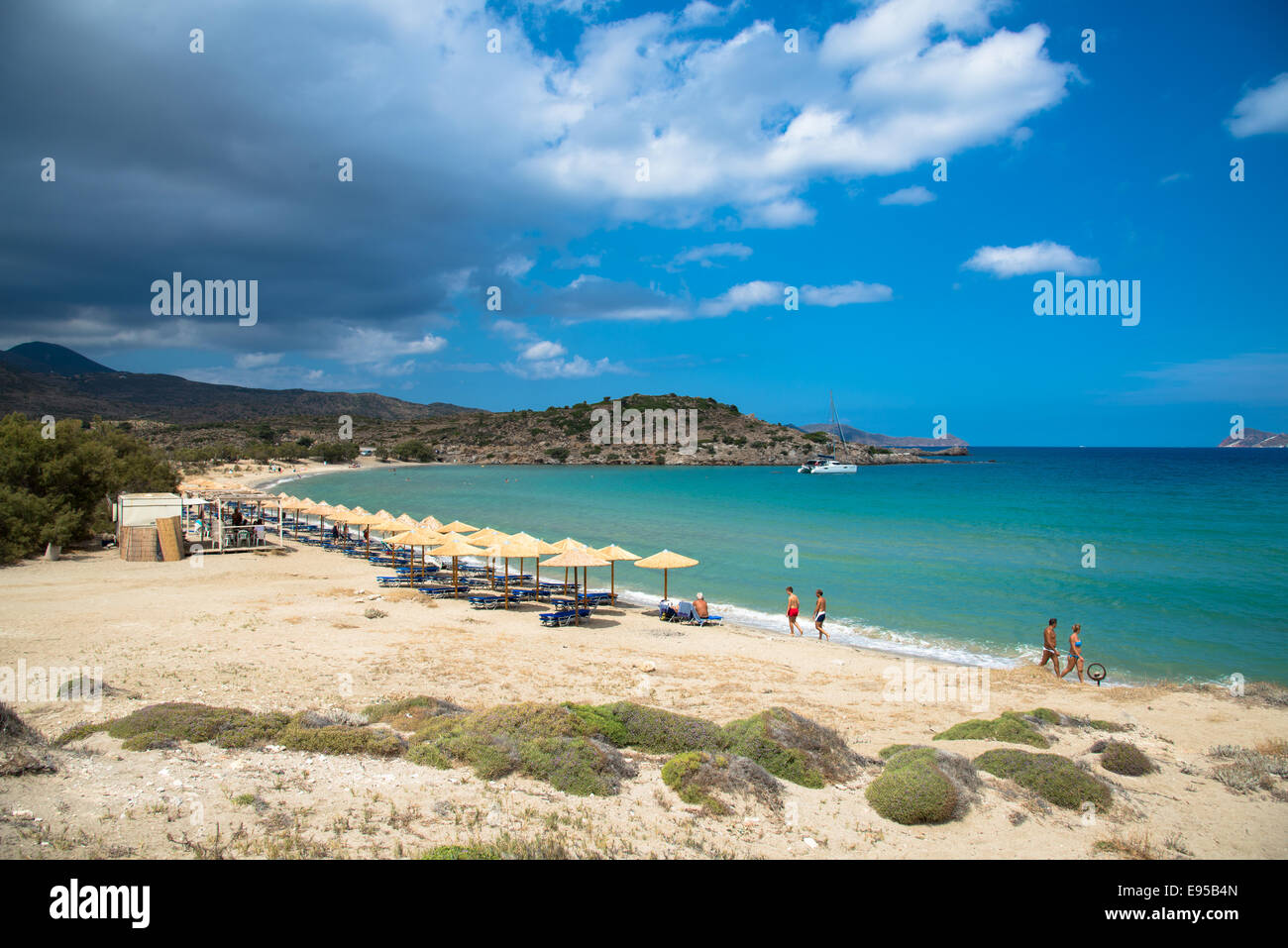 rows of parasols at the beach of Kanava at Milos, Greece Stock Photo ...