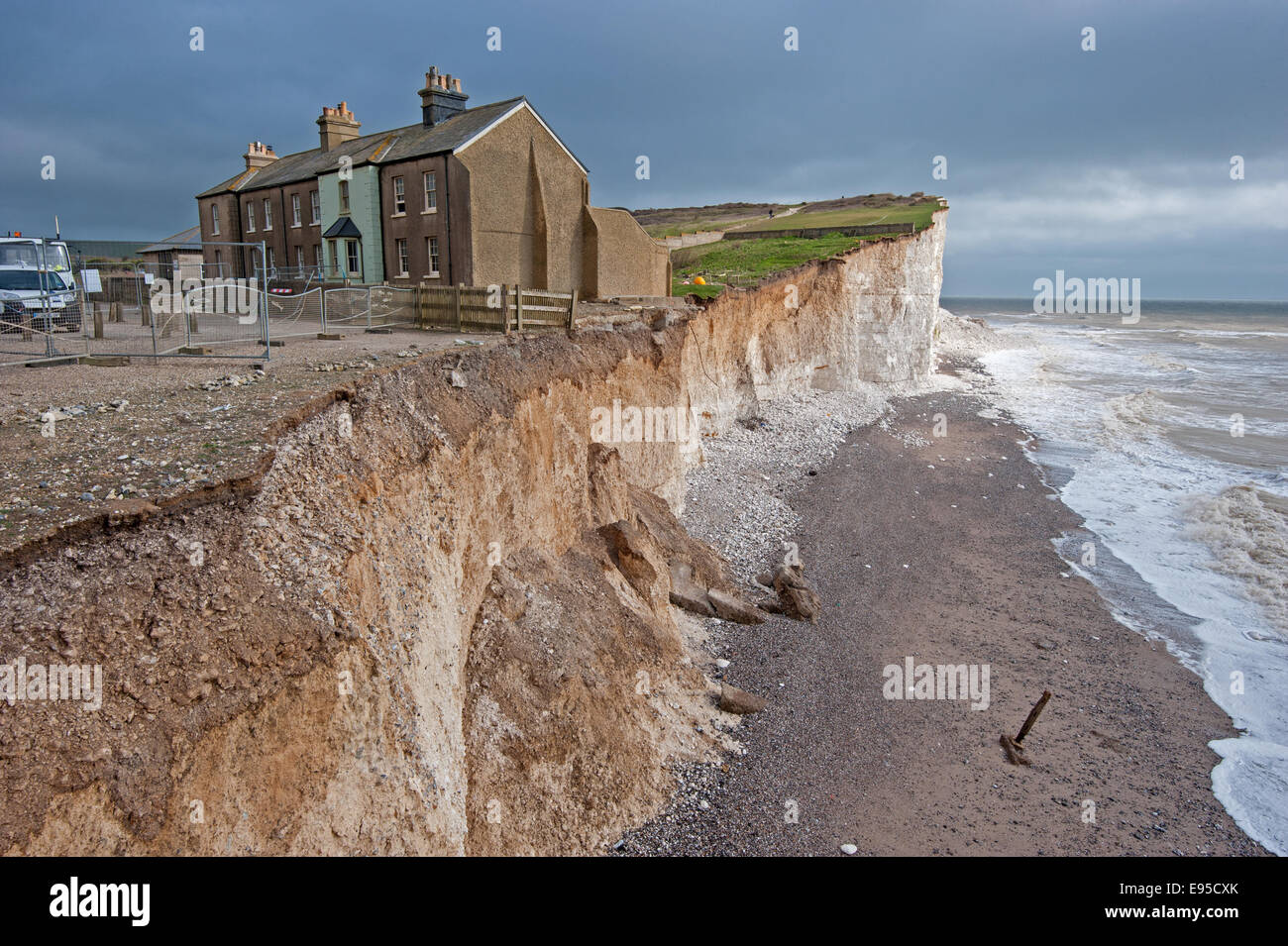 The chalky cliffs at Birling Gap continue to erode at pace after a spell of bad weather and cracks continue to appear Stock Photo
