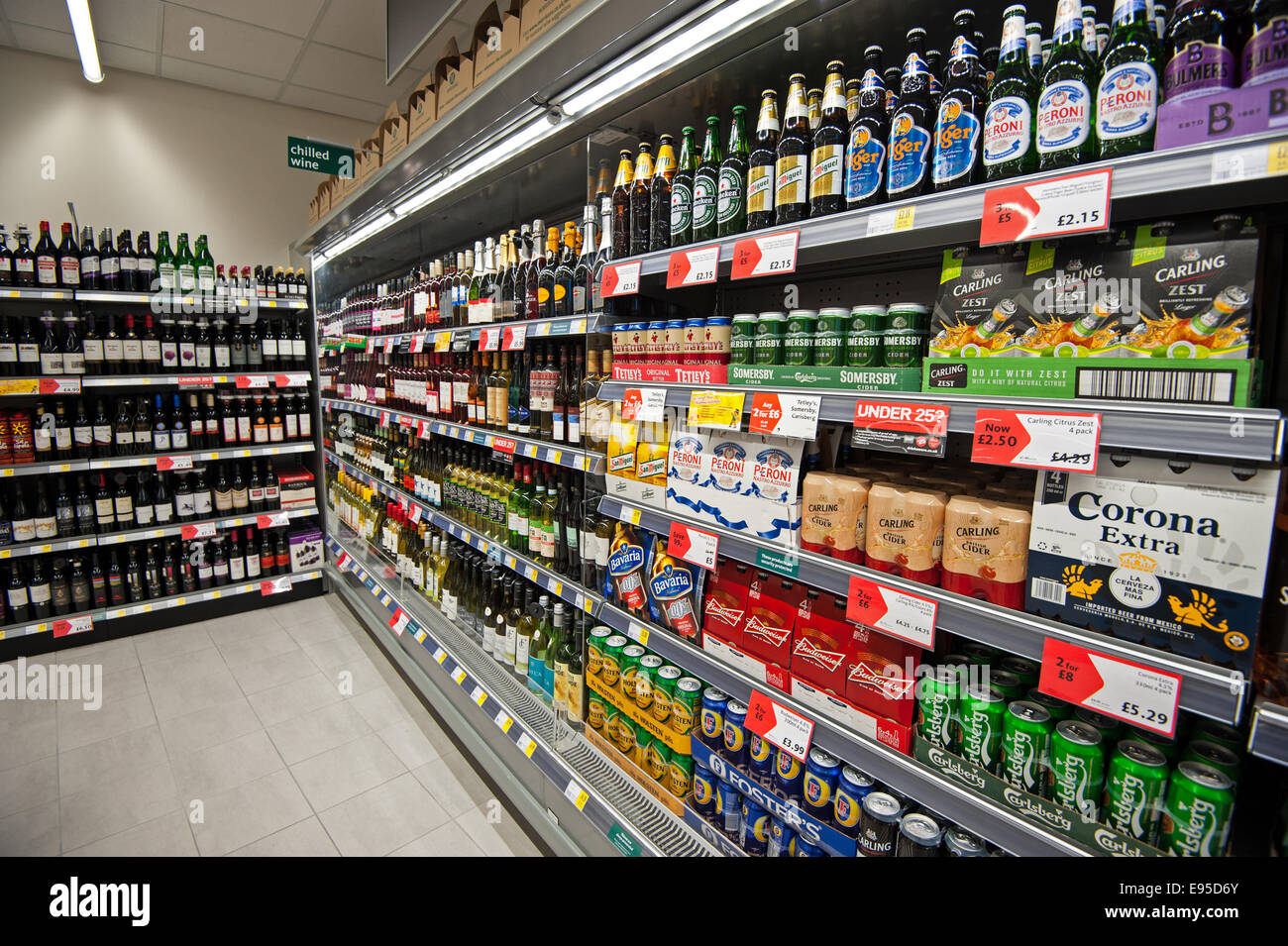 Supermarket shelves filled with alcohol Stock Photo