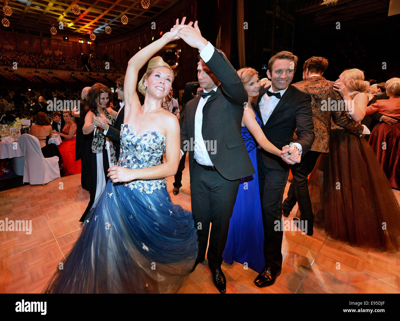 Leipzig, Germany. 18th Oct, 2014. The former figure-skater Tanja Szewczenko and her partner Norman Jeschke dance at the 20th Opera Ball in Leipzig, Germany, 18 October 2014. Under the motto 'Good Evening Houston - Let's have a Ball', the ball is expected to draw around 2,000 guests. Photo: Hendrik Schmidt/dpa/Alamy Live News Stock Photo