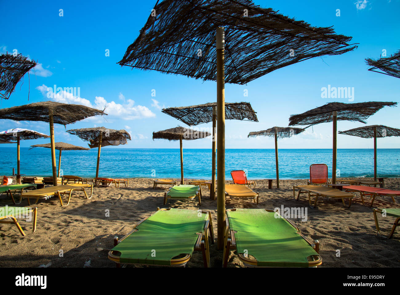 parasols at beach of paliochori milos greece Stock Photo