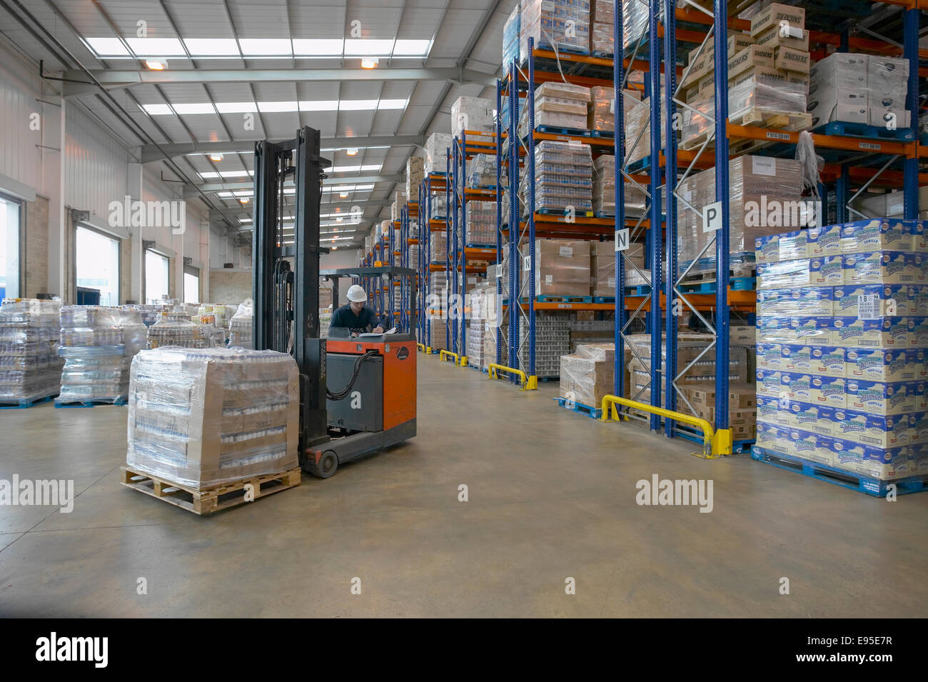 Storage warehouse forklift truck racking Stock Photo