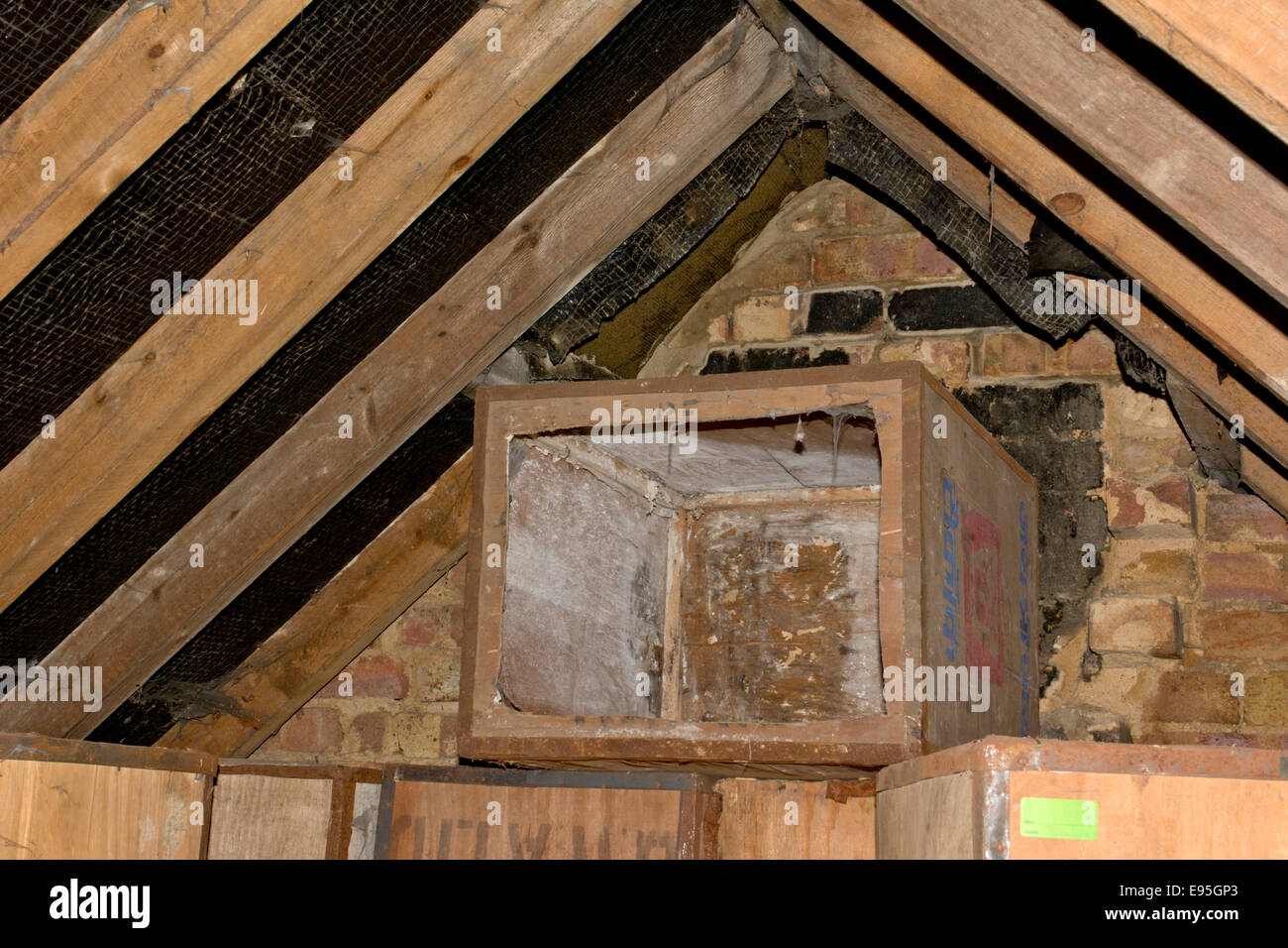 Empty tea chest in a house loft Stock Photo
