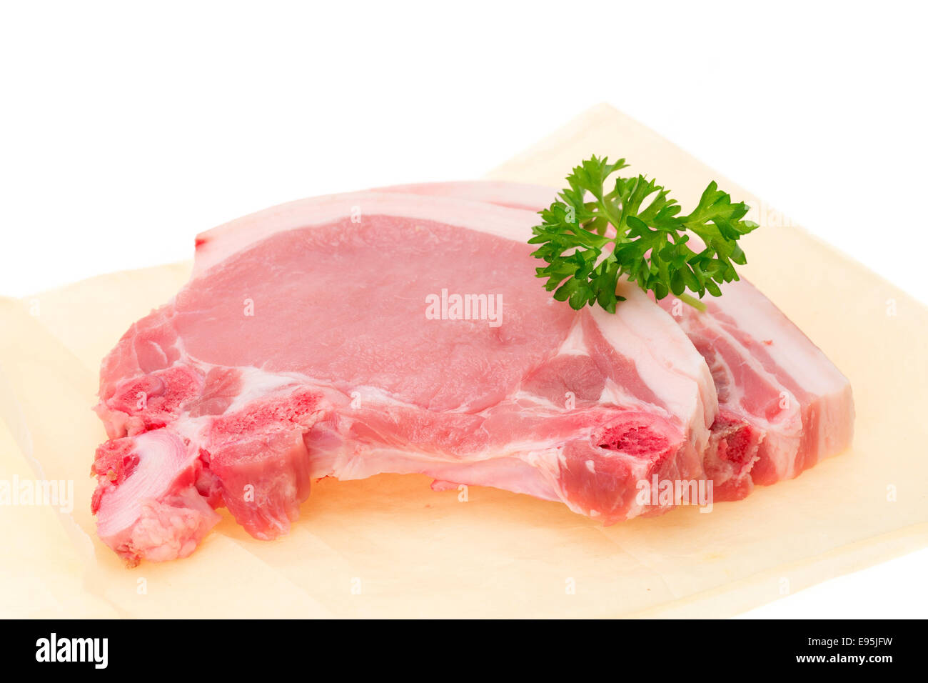 Two pork loin chops close-up, studio isolated Stock Photo