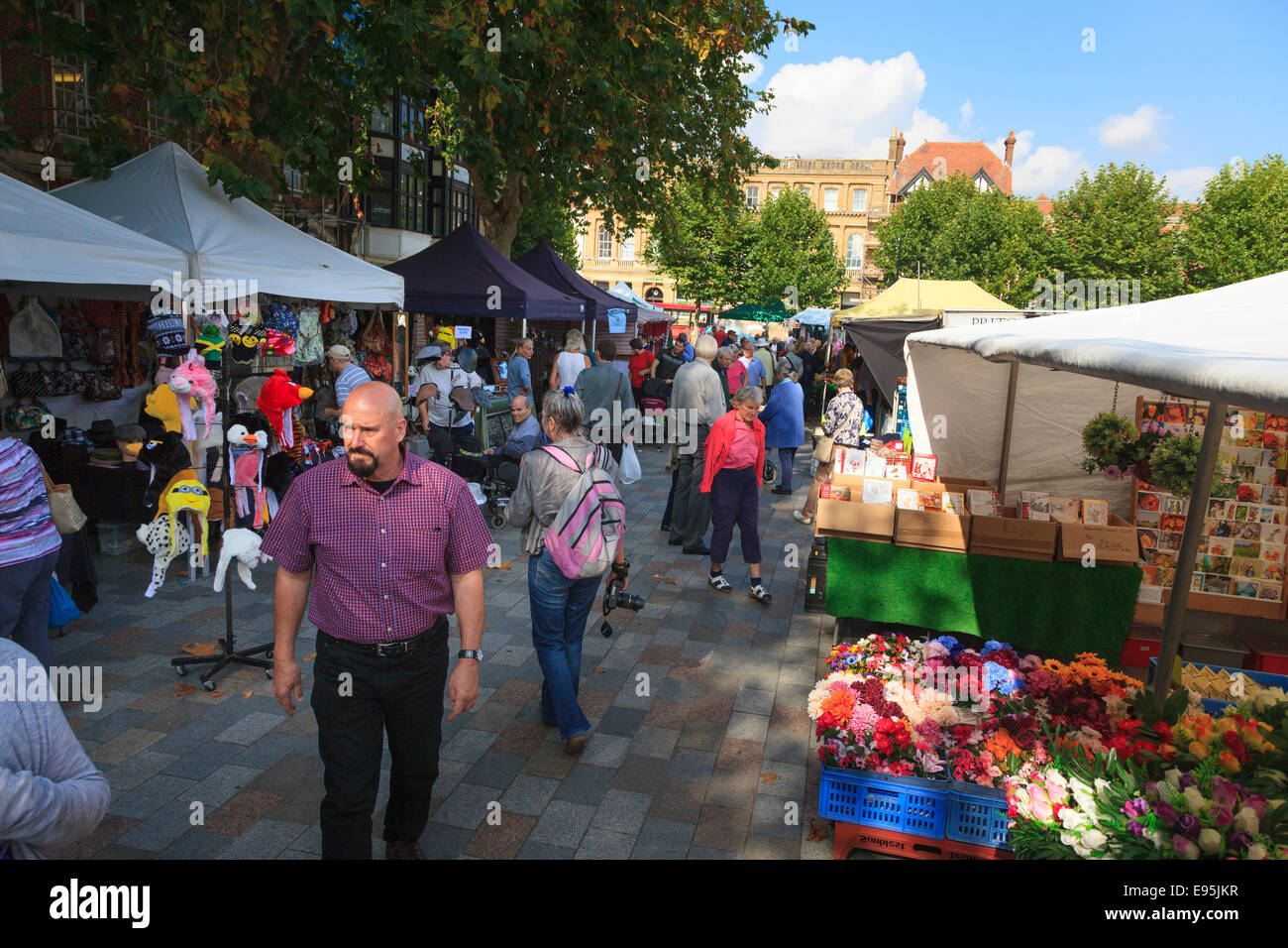 Busy Salisbury market in the city centre on a sunny day Stock Photo